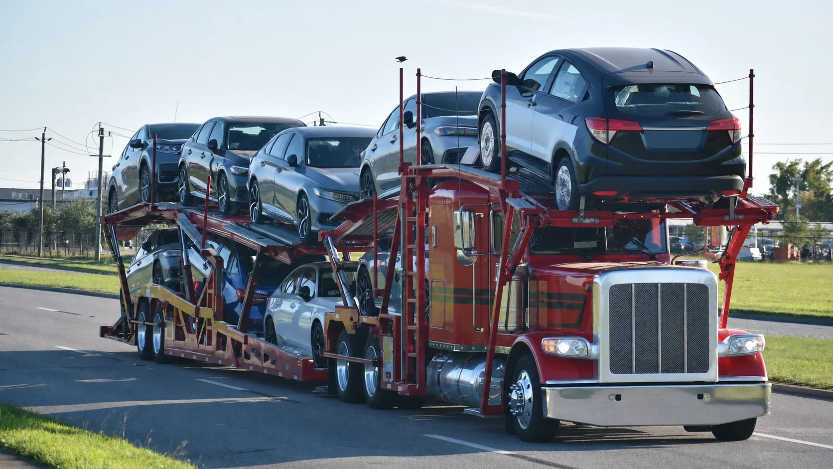 Auto carrier truck transporting passenger vehicles on a Texas road